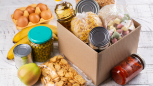 box of groceries and canned goods
