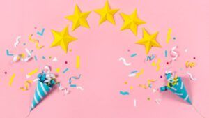 five stars with celebration cones and confetti
