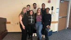Student Trustee Brandol Ogando-Saladin with other student members of SGA