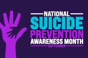 Graphic for National Suicide Prevention Awareness Month in September, featuring a silhouette of a small hand resting on a larger hand.