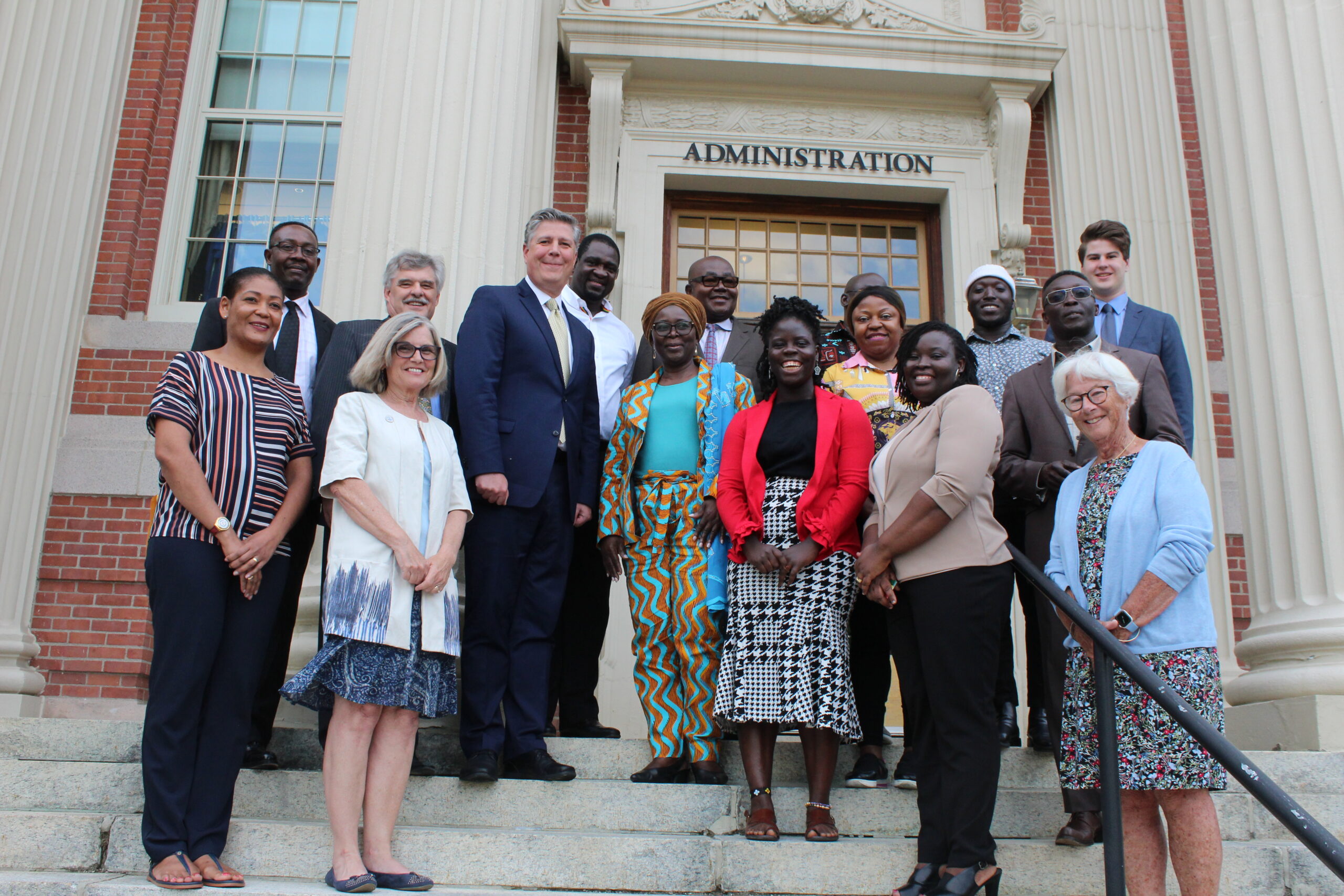 President Barry Maloney and Ambassador Hajia AlimaMahama, (center, blue top), flanked by the Ghanaian delegation and members of the Worcester State Community