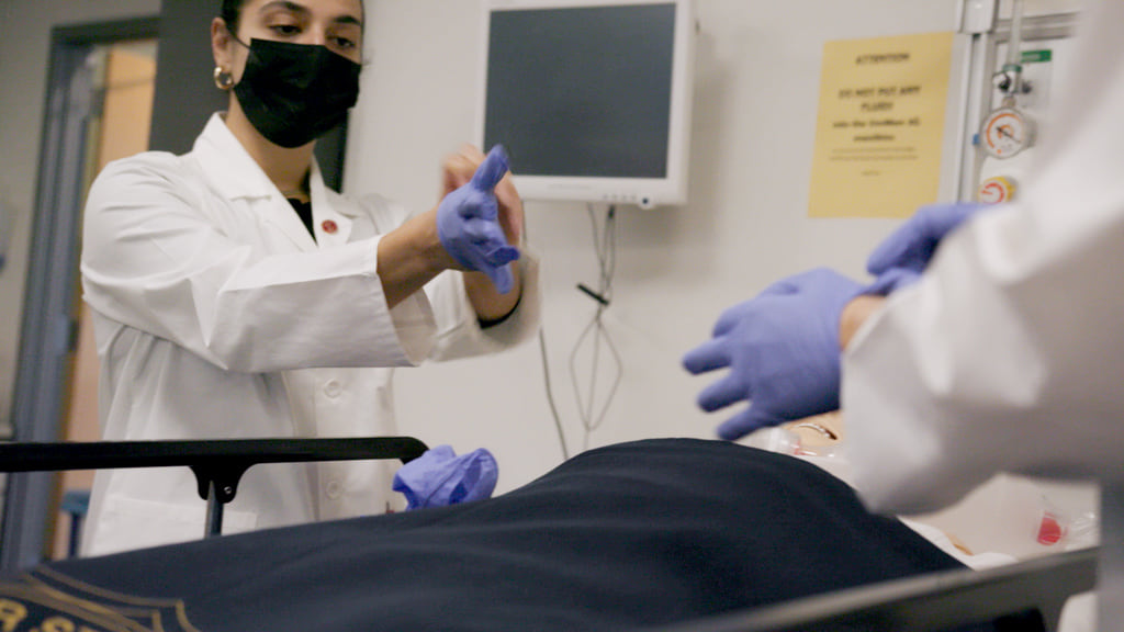 Nursing Students working in simulation lab at Worcester State