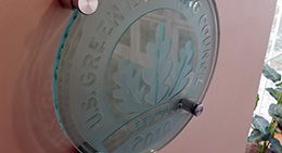 The LEED Building plaque hanging in the administration building