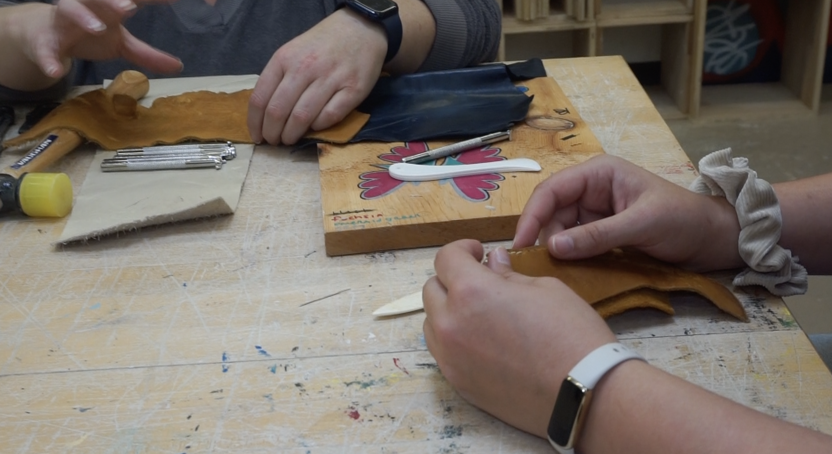 Worcester center for the crafts at Worcester State working with leather