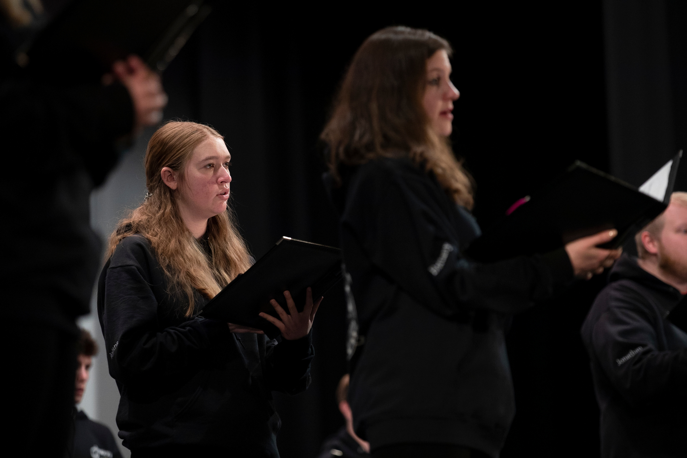 Worcester State University chorale members return to in-person performance in Sullivan Auditorium during the Spring 2022 Semester