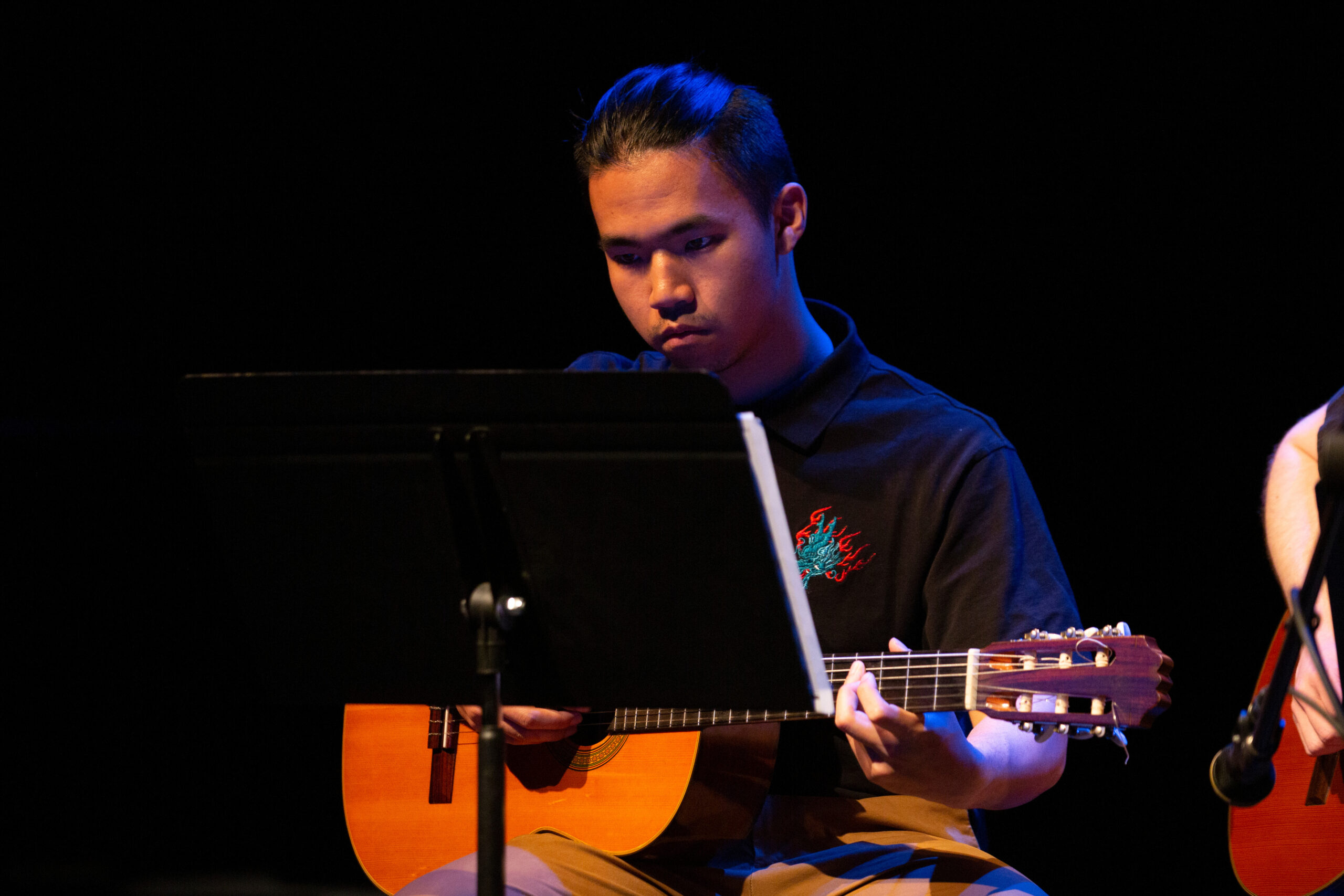 Ziliang Jin performs with Worcester State VPA's guitar ensemble at the Spring 2022 Mosaic of Music