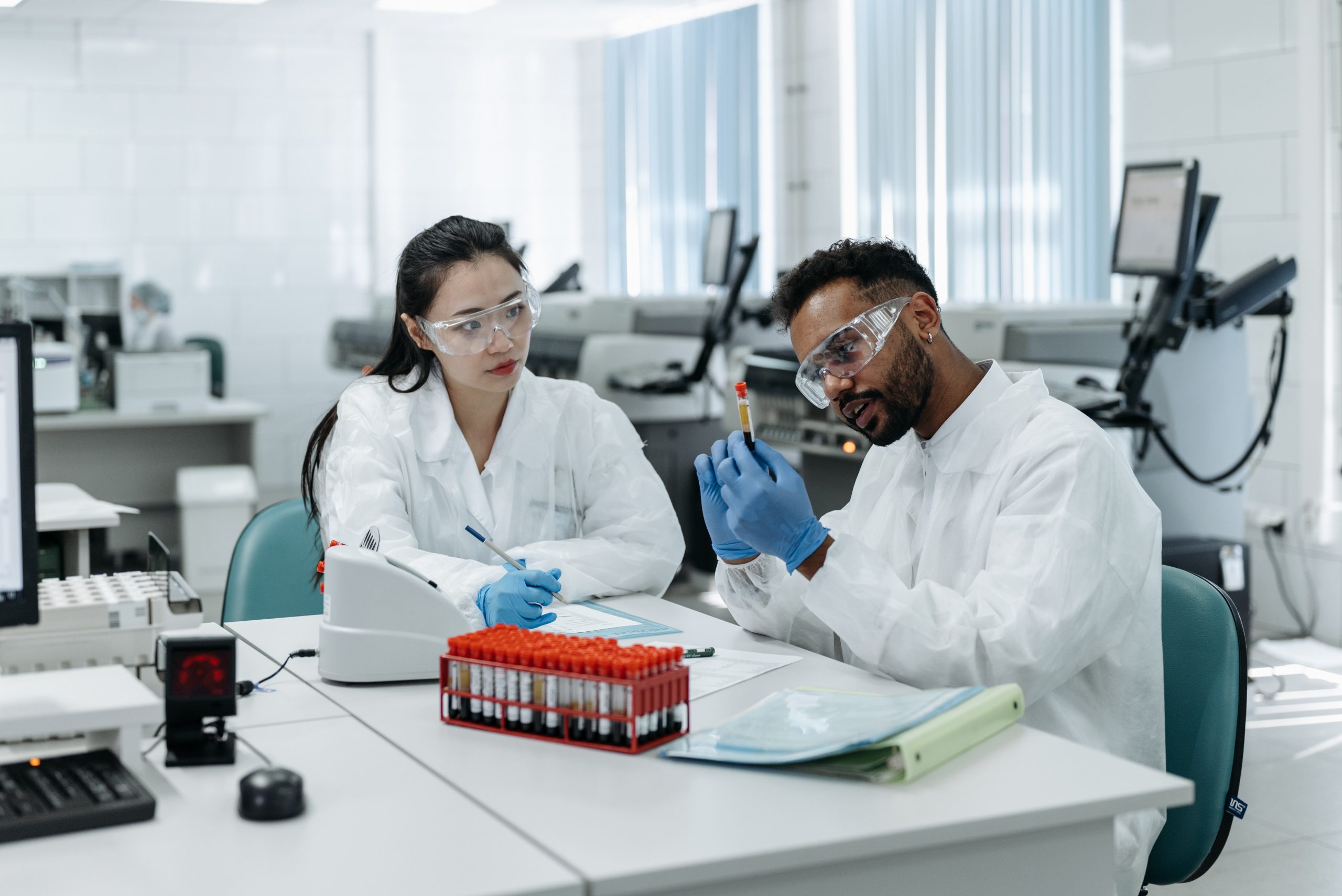 Two students doing lab work