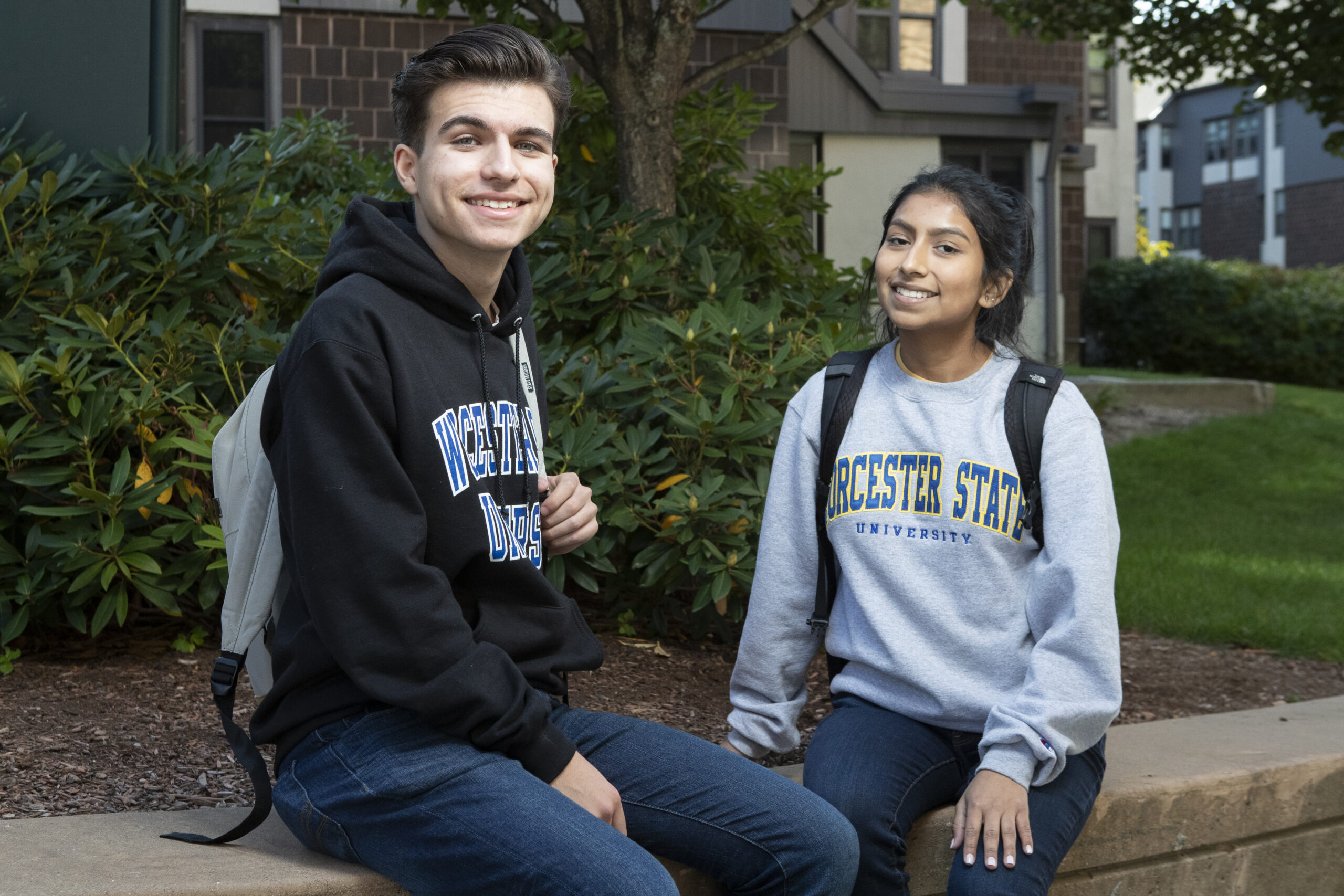 Two Worcester State University students smiling on campus