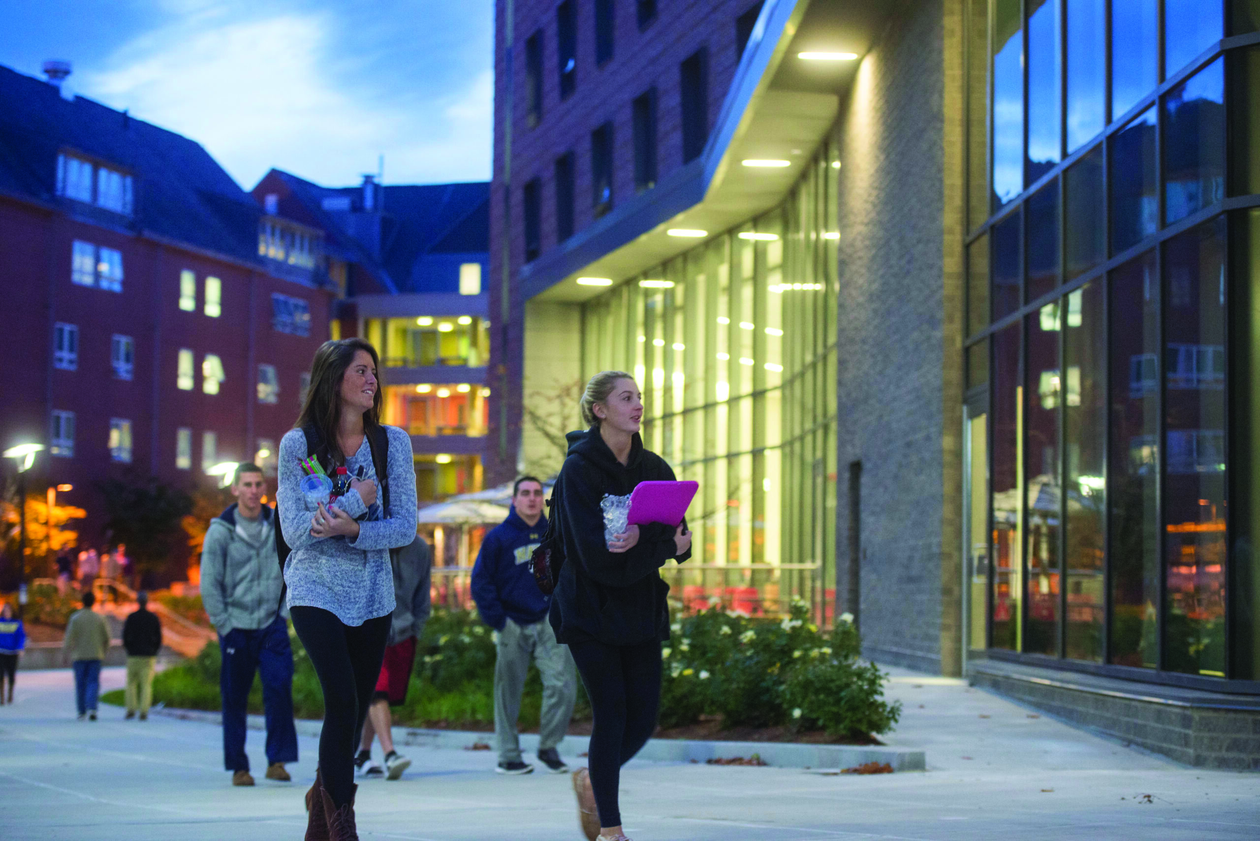 Worcester state students walking to a night class