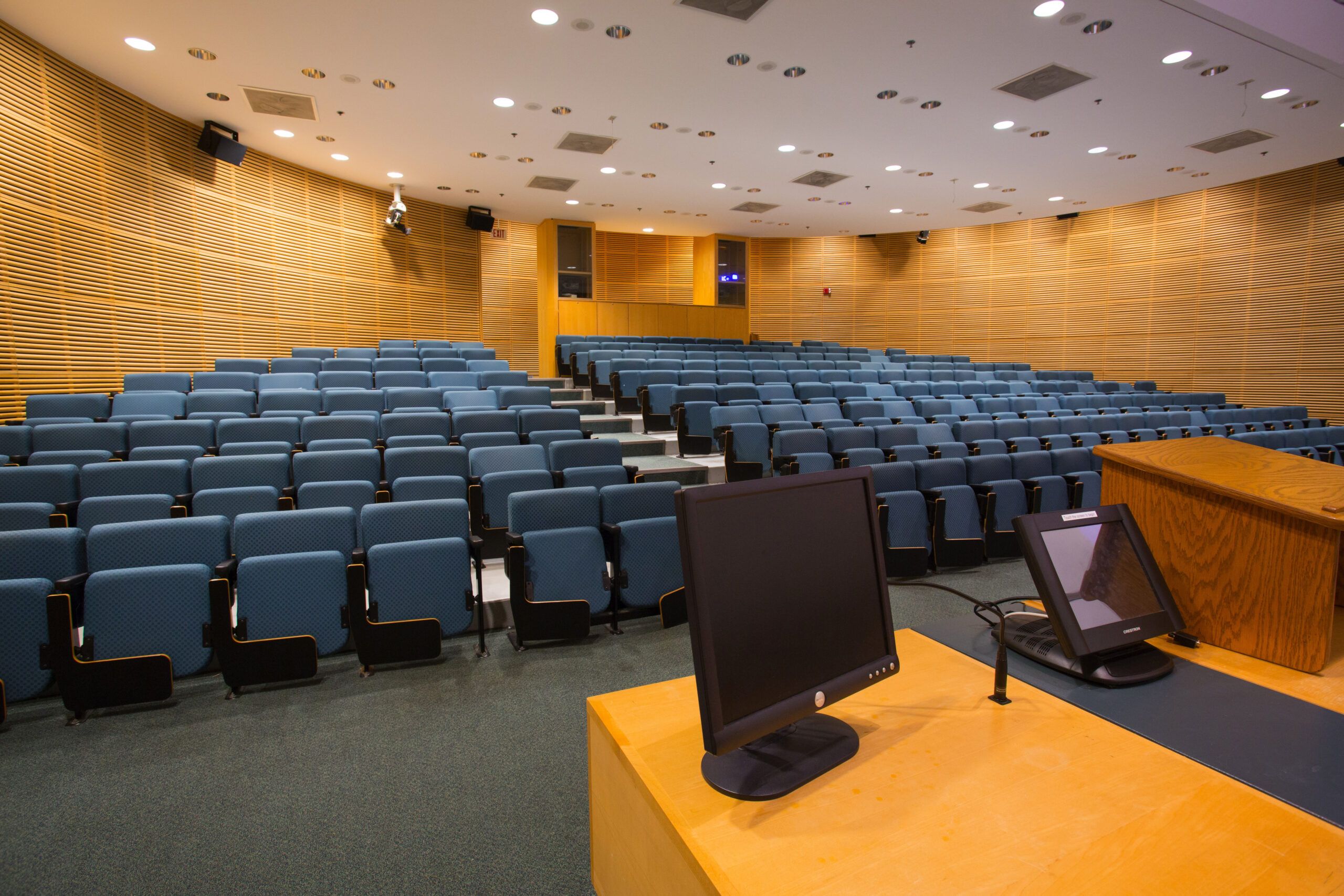 An empty Worcester State lecture hall with seating