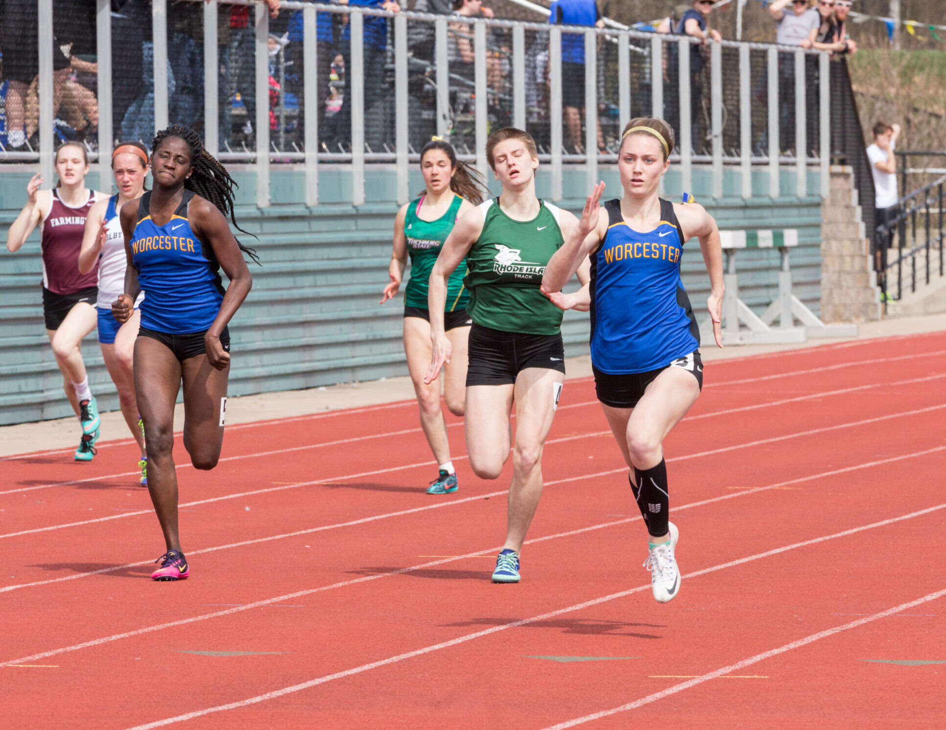 A Worcester State track athlete running in a race
