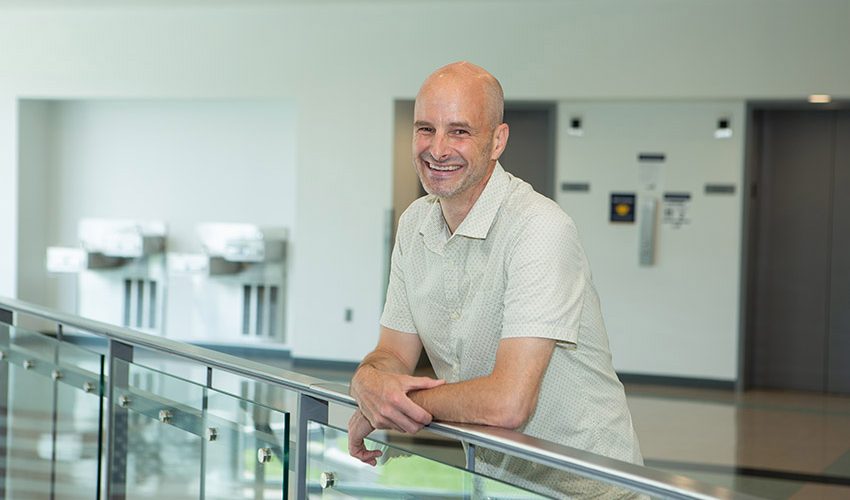 A smiling biology professor